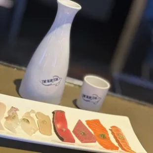 Sake and a sample of each of the fish from our platter