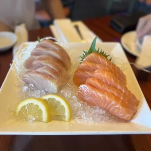 a plate of sashimi