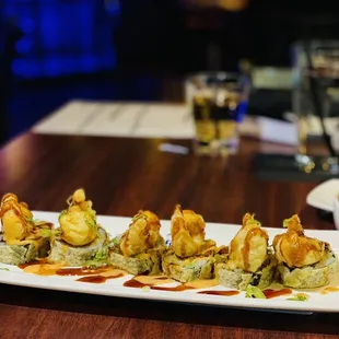 a plate of shrimp appetizers