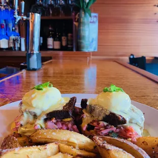 We&apos;re open for brunch!!! Here&apos;s our lemongrass braised short rib &amp; house-made kimchi Benedict- on our own sweet potato English muffin!!