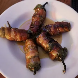 Bacon wrapped stuffed jalapenos