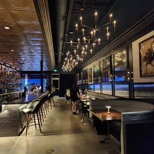 a restaurant with a long bar