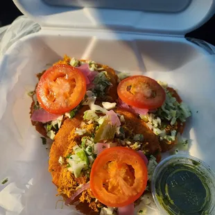 a sandwich in a styrofoam container