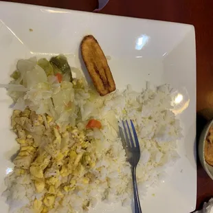 My hard fought and Well Worth Dish of the Day: Akee and Salt Fish, side of cabbage, white rice with fried plantain YaaaaYuMmm