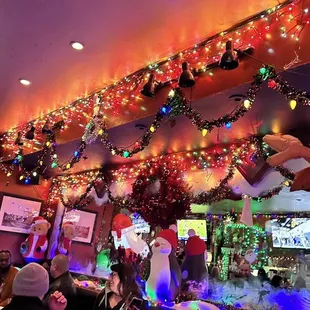 a restaurant decorated for christmas