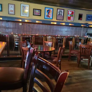 a restaurant with tables and chairs
