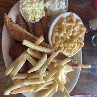Fried fish, hush puppies, fries, Mac n cheese