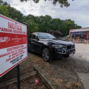 Outside. Entrance to parking lot. Be careful entering and exiting. It&apos;s steep.