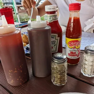 Eastern and Western NC BBQ sauces (left and right, respectively), Texas Pete Hot Sauce, and other condiments.