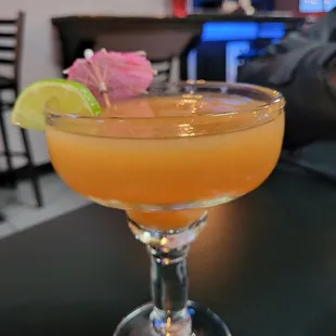 a cocktail in a coupe glass