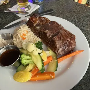 End Cut prime Rib with rice and steamed veggies paired with a Sierra Nevada Summerfest Lager.