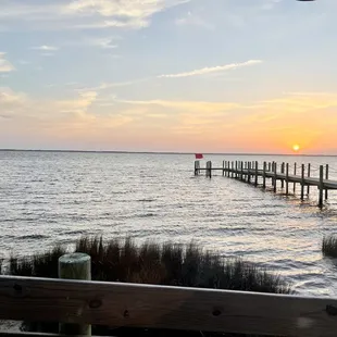 Sunset view from our table - GORG! They take reservs - before calling, make sure to find out what time sun sets on day you want to go