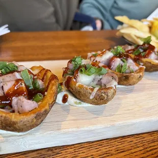Sausage stuffed potato skins   These were really good.  They sat on a thick bed of a delicious sauce that was thick like cc/sc sauce