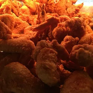 A mountain of fried chicken wings.