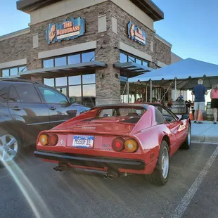 Car in front of Bluegrass.