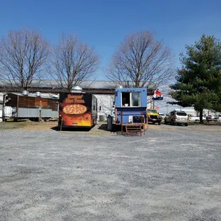 a bbq truck parked in a parking lot
