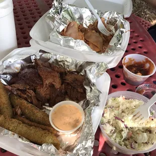 Brisket, pit turkey, fried pickles and Cole slaw and apple butter BBQ sauce!! So good, the place is a little hard to find though.