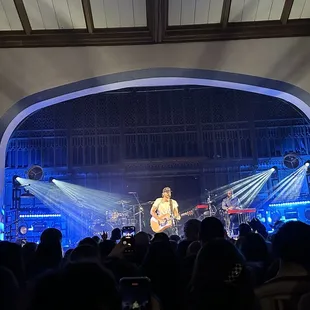 a band performing on stage