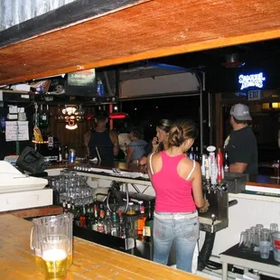 a group of people at the bar