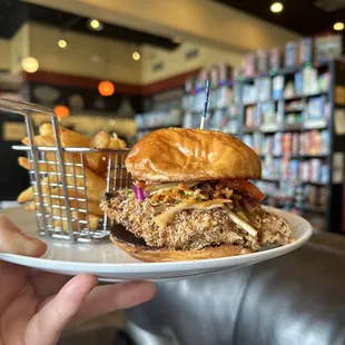 a person holding a plate of food