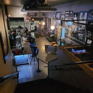 a man sitting at a table in a bar