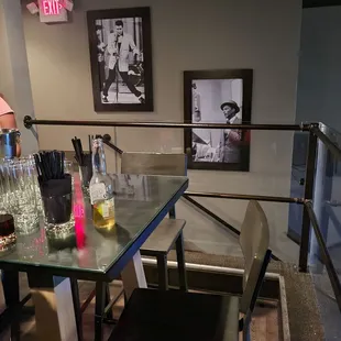 a glass table and chairs