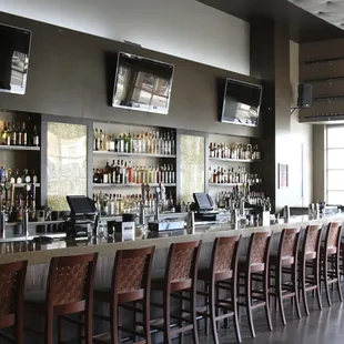 a bar with a lot of bottles of liquor