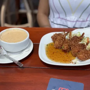 a plate of food and a cup of coffee