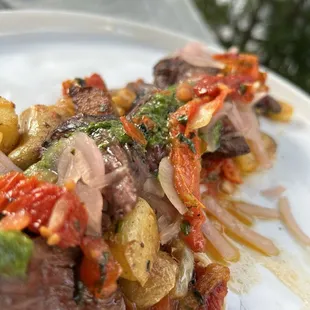 Hanger Steak with potato, charred tomatoes, pickled onion, chimichurri
