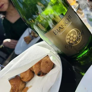 Mini warm muffins, with our bottle of champagne to make our mimosas.