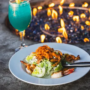 How about a Wedge Salad with shrimp added? Can't forget a specialty cocktail while sitting at the fire pit!