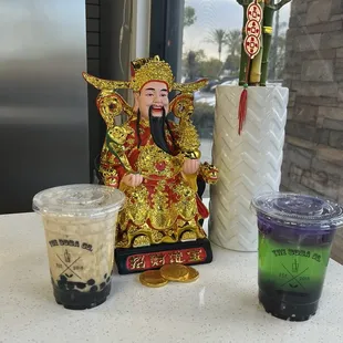 Milk tea with boba and Butterfly Green Apple tea with boba