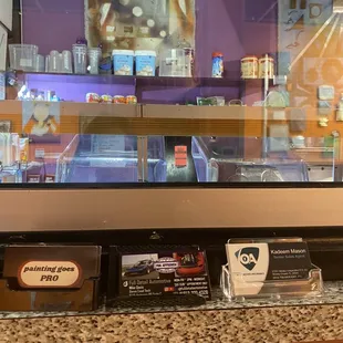 a counter with various items on it