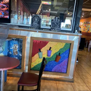 a table and chairs in a restaurant