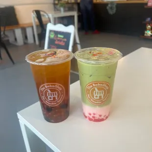 Mango green tea and strawberry matcha tea work boba