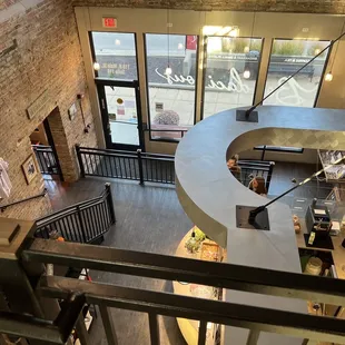 Overlooking the downstairs from the upstairs seating area
