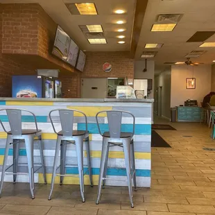 the counter and chairs
