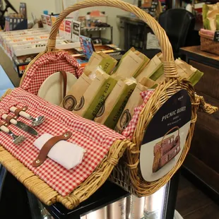 a wicker basket filled with books