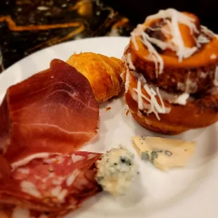 Cinnamon muffin, assorted meat and cheese