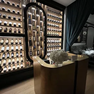 a display of wine bottles in a wine cellar