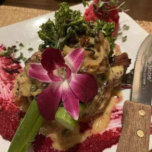 Bone-in pork chop with broccolini and beet root mashed potatoes