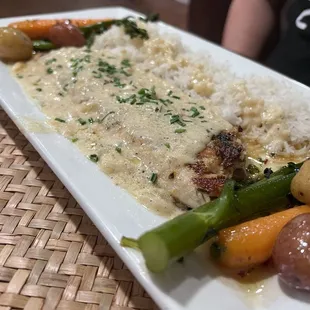 "The Carolina" fish, rice, and vegetables