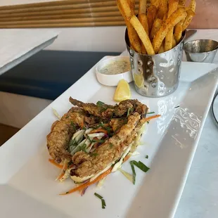 Softshell crab with Cajun fries and a bed of coleslaw