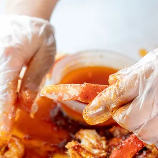 a person holding a piece of food