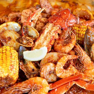 a plate of seafood and corn