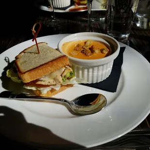 a sandwich and soup on a plate
