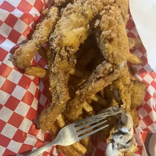 The over-breaded frog legs.