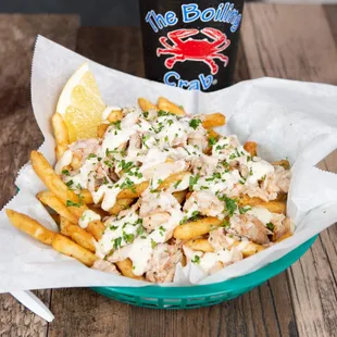 Crabber Fries - choice of fries topped with lump blue crab meat and garlic-lemon aioli