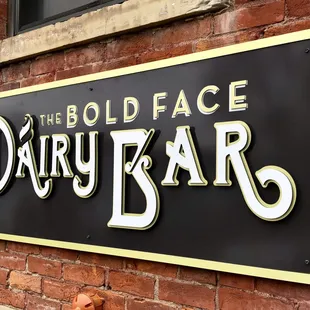 Very cool vintage typeface sign adorning the storefront.