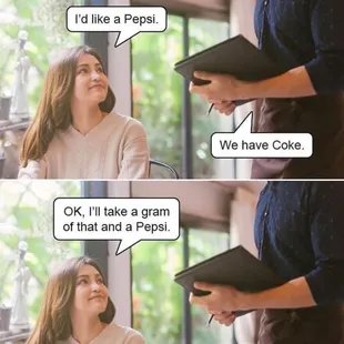 a woman talking to a man in a restaurant